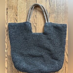 Black woven beach bag. NWOT.